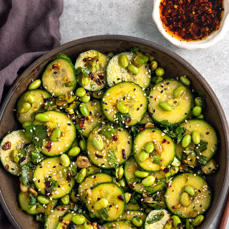 Cucumber Edamame Roll sliced on a minimal plate